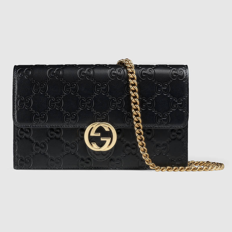 GUCCI Icon Embossed Leather Shoulder Bag in Black | ModeSens